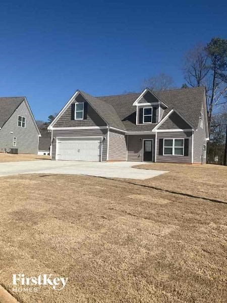 a house with a yard in front of it