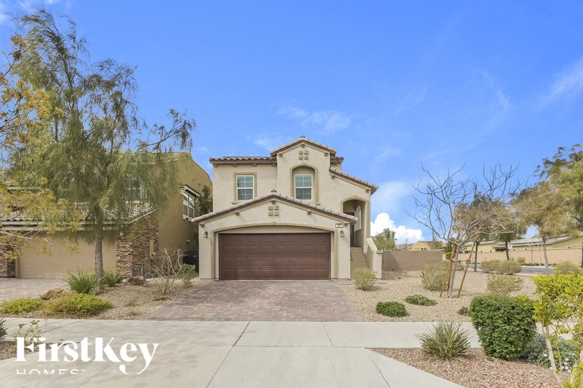 A large house with a garage is for sale.