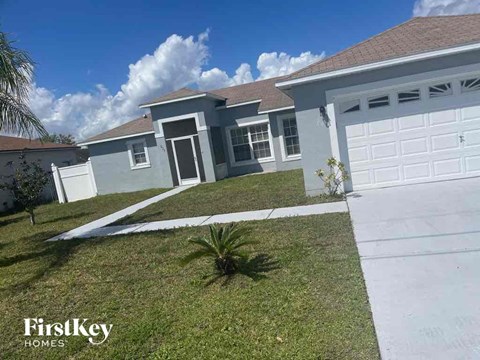 a house with a garage and a lawn