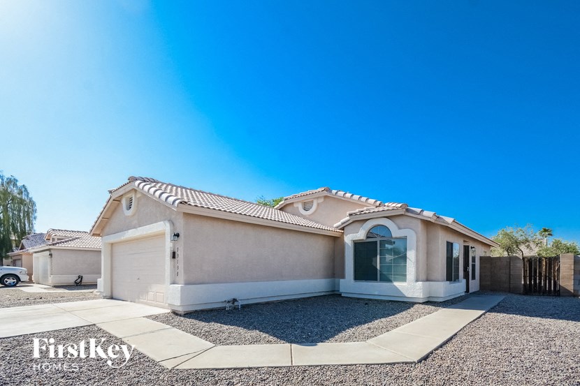 a house with a blue sky in the background