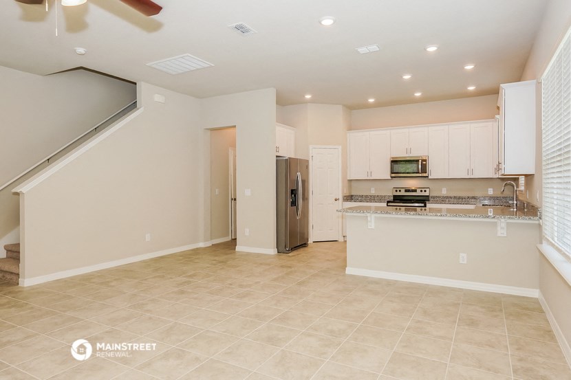 the kitchen and living room are spacious and ready for you to use