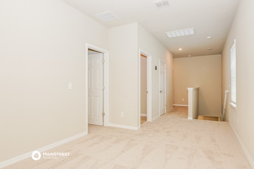 the spacious living room is clean and ready for you to use