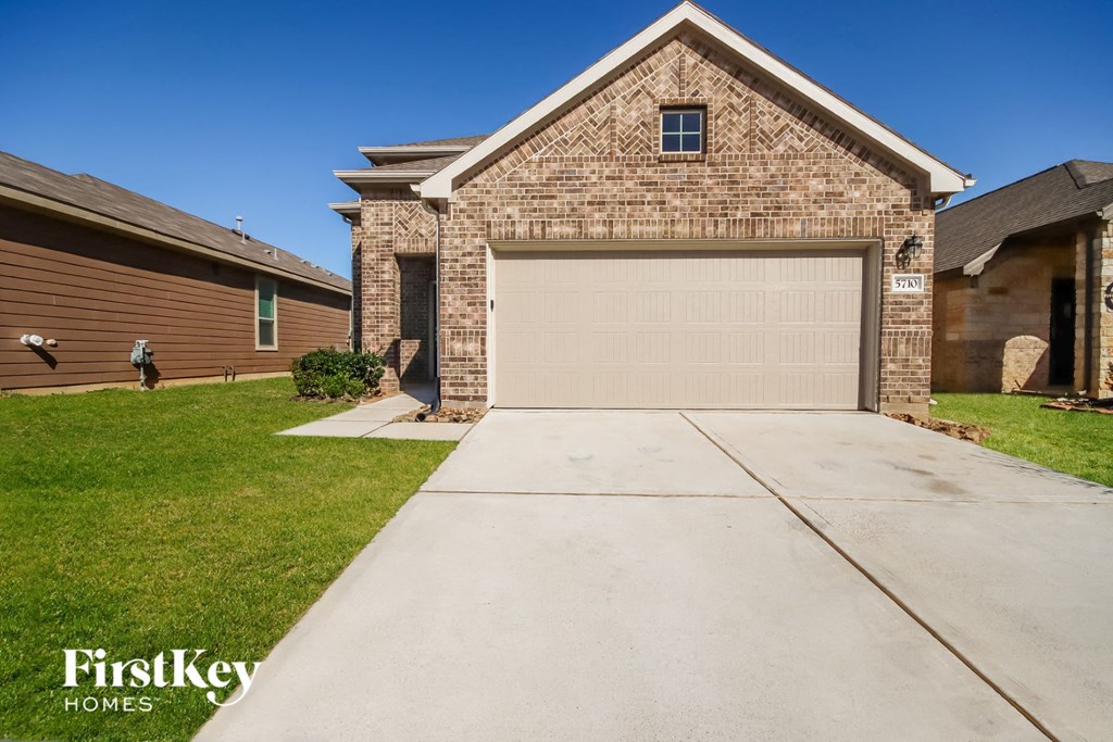 a garage door in front of a house