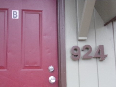 a pink door with the numbers on it