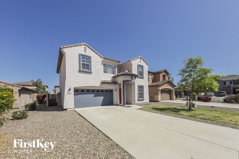 A house with a clear blue sky in the background.