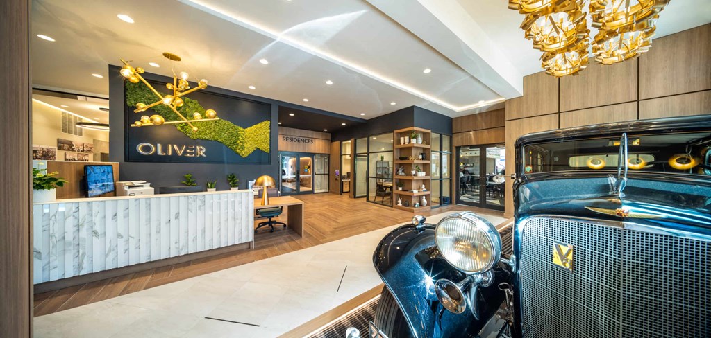 a vintage car parked in the lobby of a store