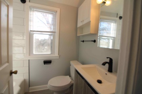 a small bathroom with a toilet and a sink