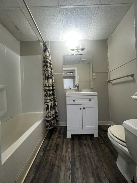 a bathroom with a sink toilet and a bath tub