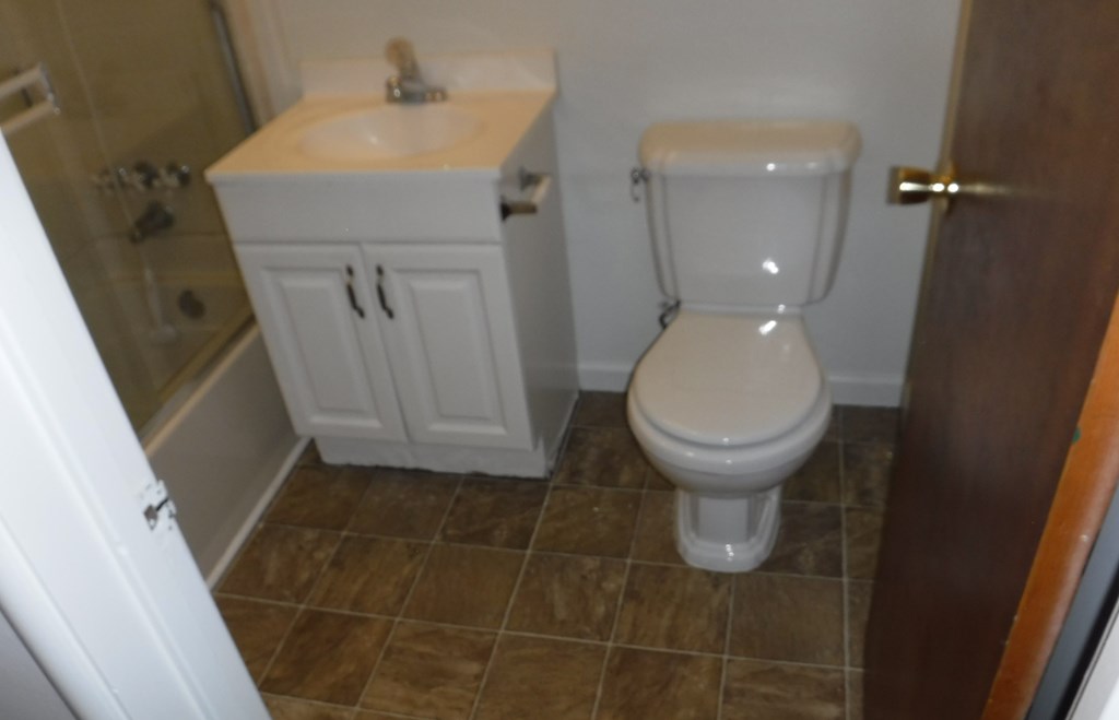 a small bathroom with a toilet and a sink