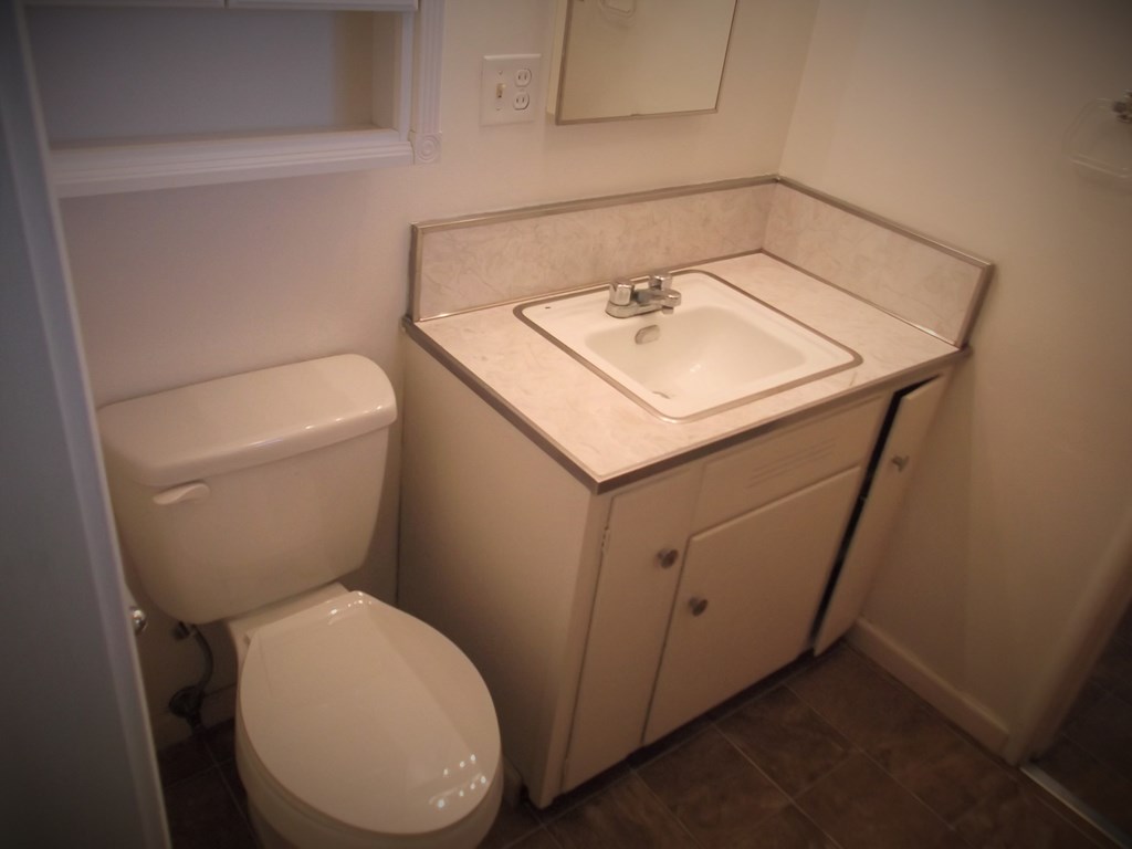a small bathroom with a toilet and a sink