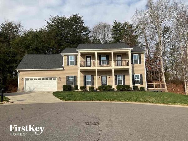 a house with a driveway and a garage