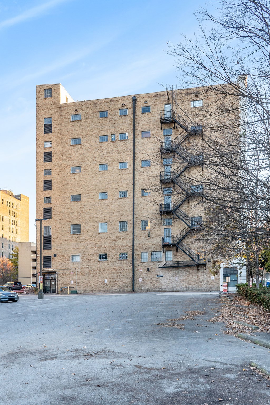 a brick building with a fire escape on the side of it