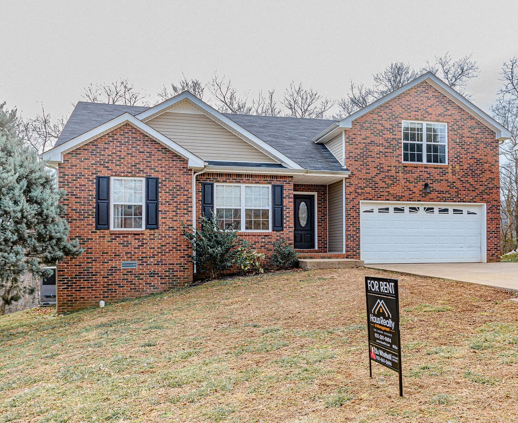 a house with a foreclosure sign in front of it