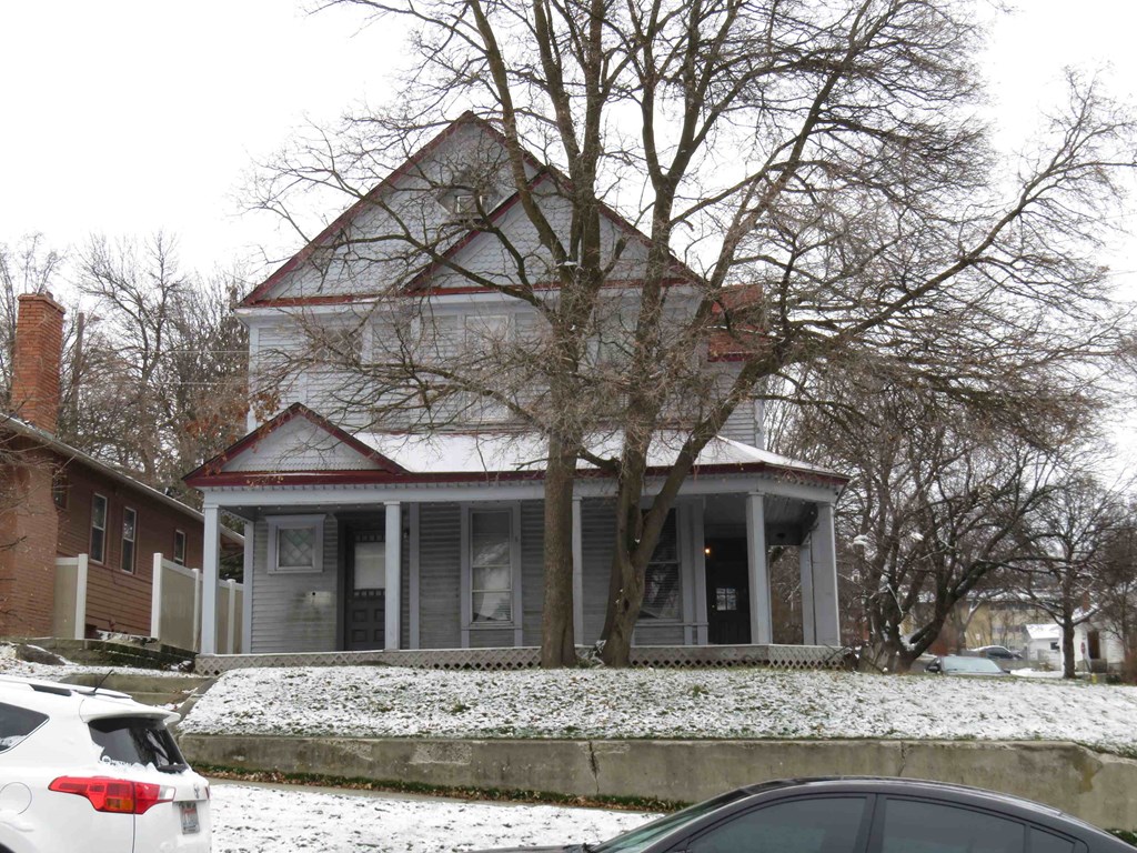 a house with snow on the ground
