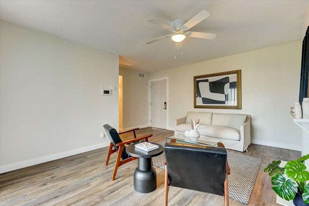 Chair and tables at The Alista Apartments, Dallas, TX, 75238