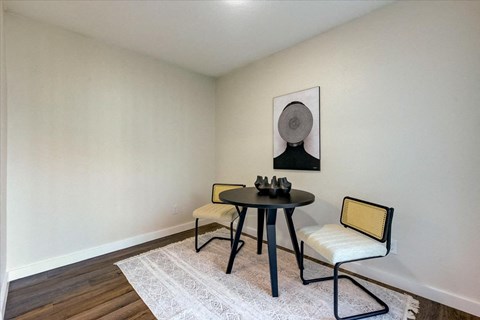 Chair and table at The Alista Apartments, Texas, 75238