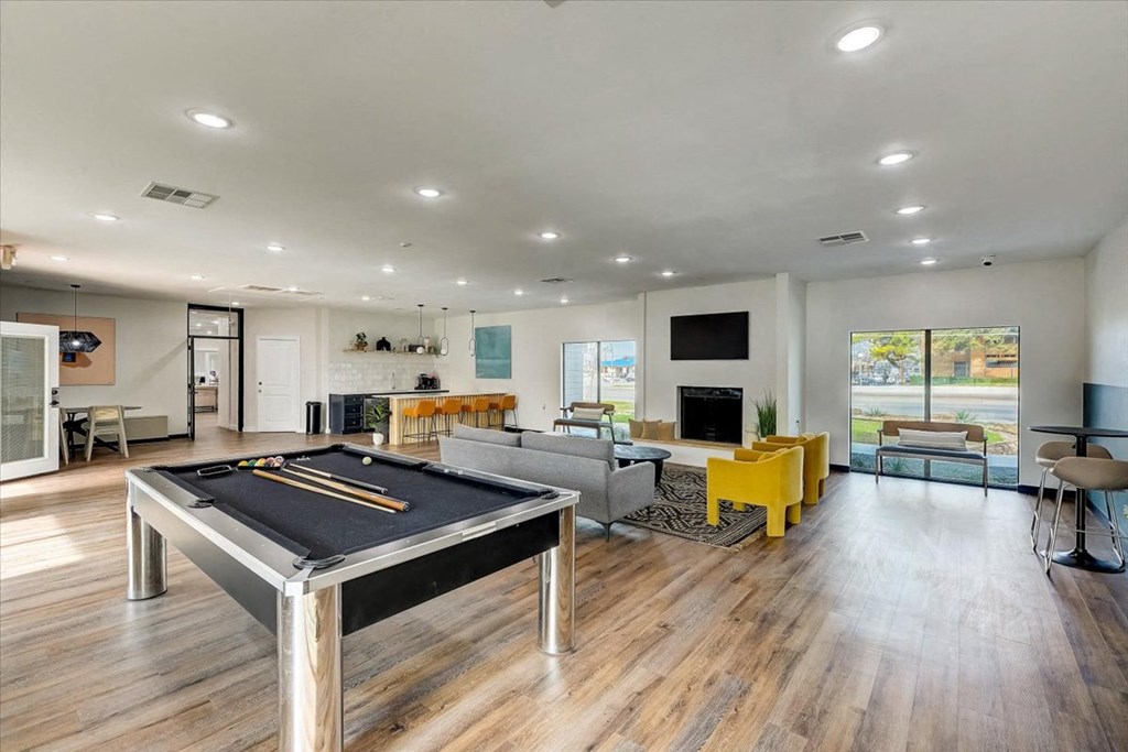 Living and kitchenat The Alista Apartments, Dallas, TX