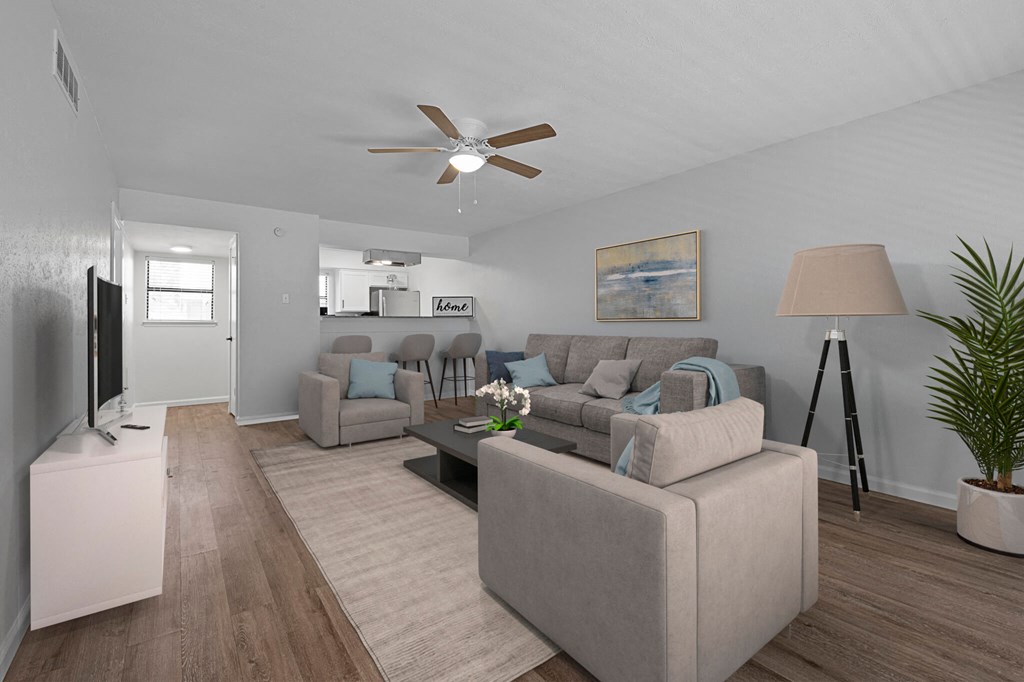 Living room couch at The Alista Apartments, Dallas, Texas