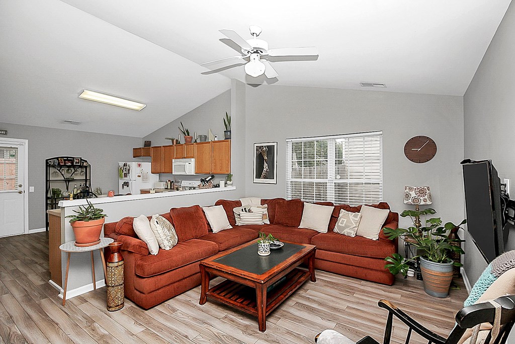 a living room with a couch and a table
