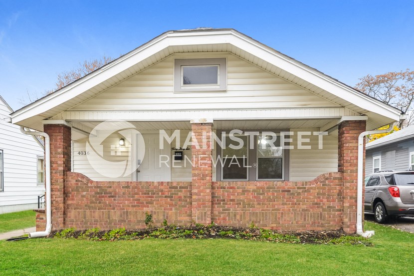 a house with a sign on the front of it