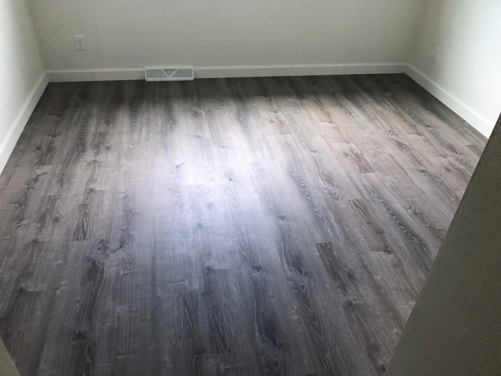 a room with a wooden floor in it