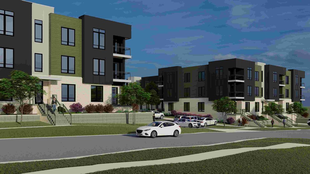 a rendering of an apartment complex with cars parked in front of it