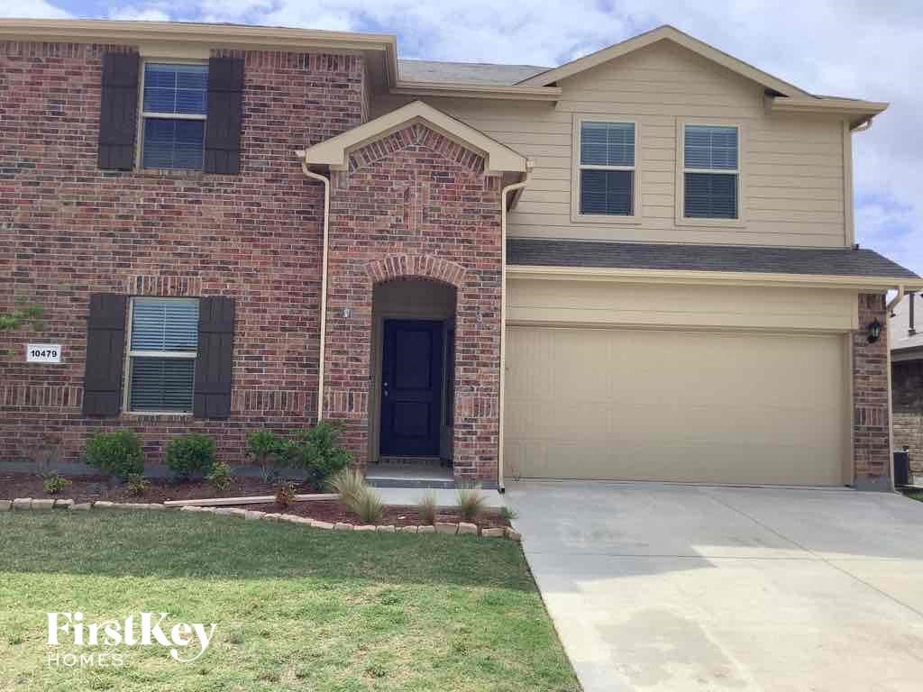 a new house with a driveway and a garage door