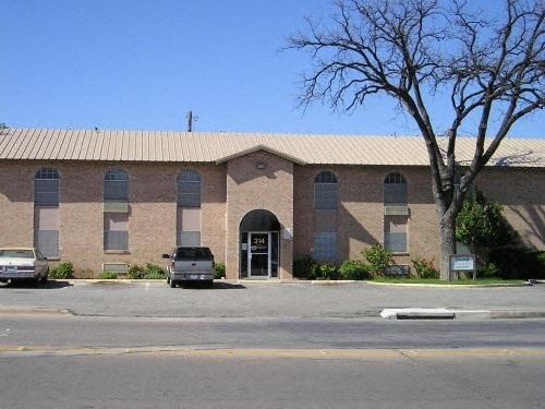 a building with a car parked in front of it