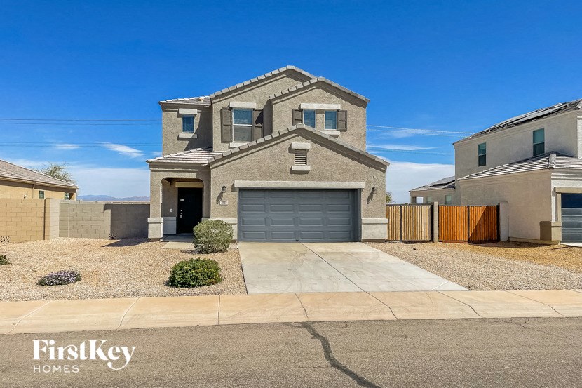 a house with a driveway and a garage door