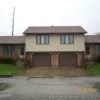 A house with a brown garage door.