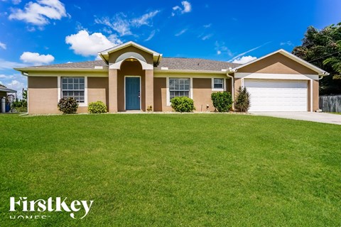 a house with a lawn in front of it