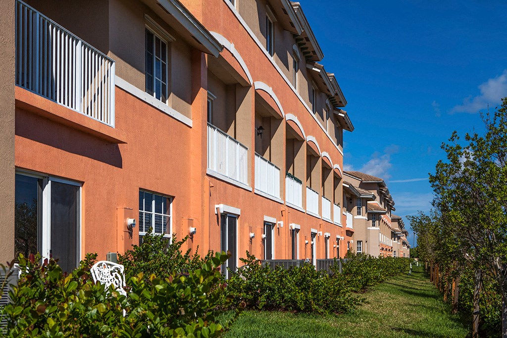 Preserve at Boynton Beach community exterior with palm trees
