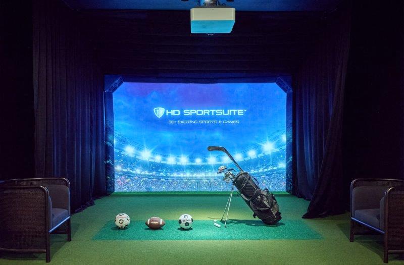 a golf set up in a room with balls