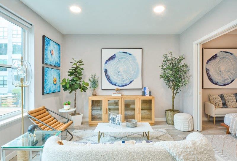 a living room with a couch and a table