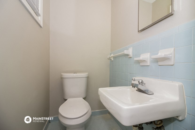 a small bathroom with a toilet and a sink