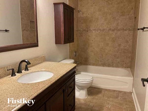 a bathroom with a sink and a toilet