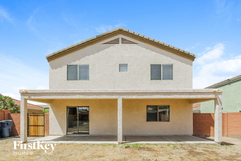 front view of a white house with a porch