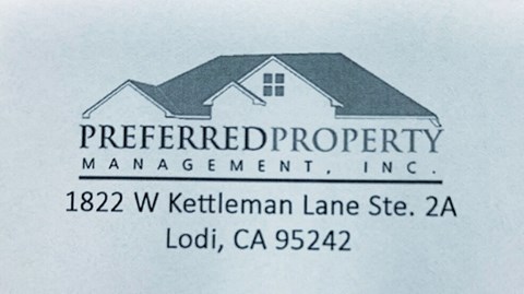 A business card for Preferred Property Management, Inc. with a house logo.