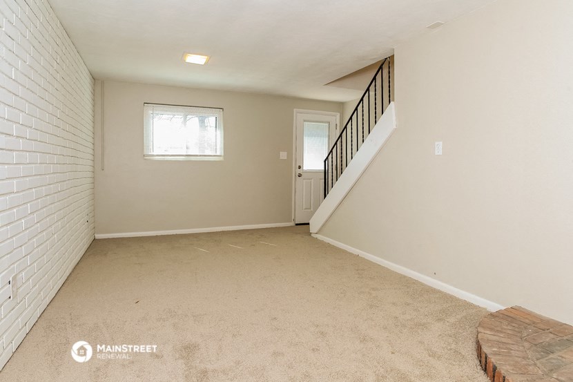the upstairs living room is spacious and ready for you to use