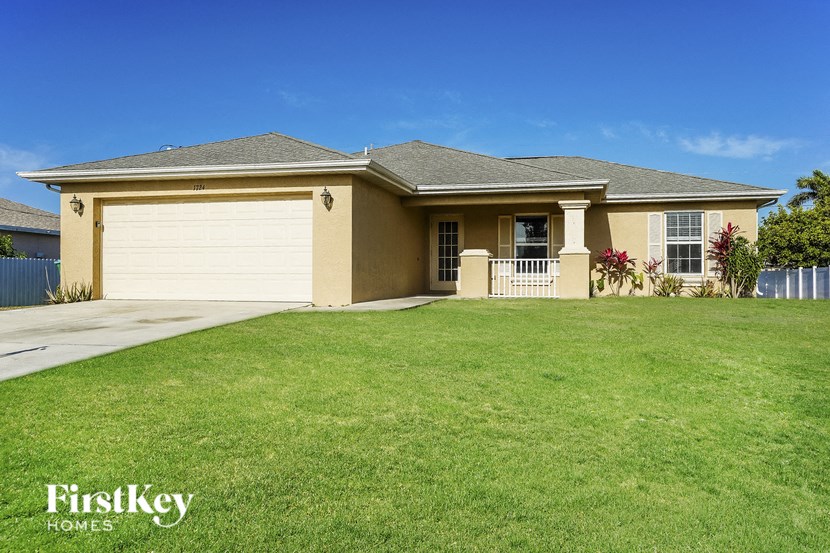 a house with a lawn in front of it
