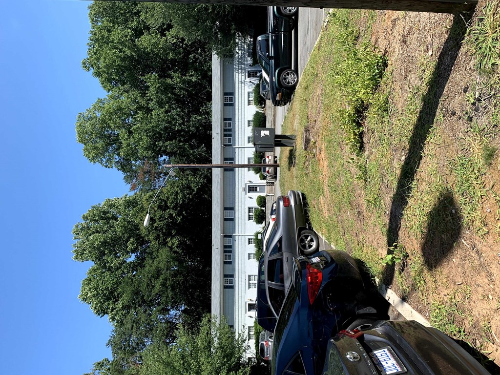 a car is parked on the side of a road