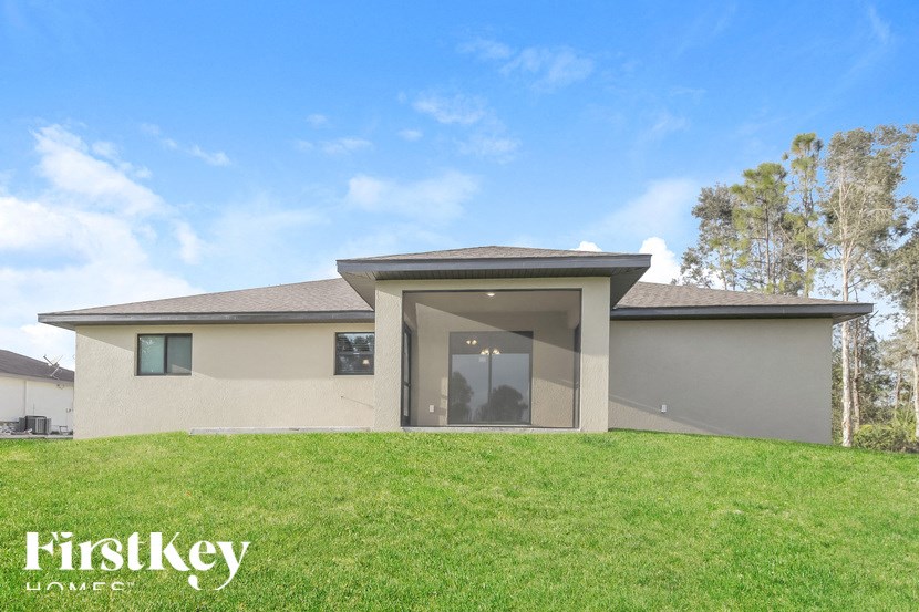 a brand new house with a lawn