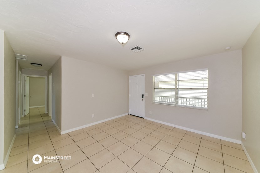 the living room and dining room are spacious and clean