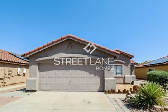 a house with a garage door and the name street lane homes