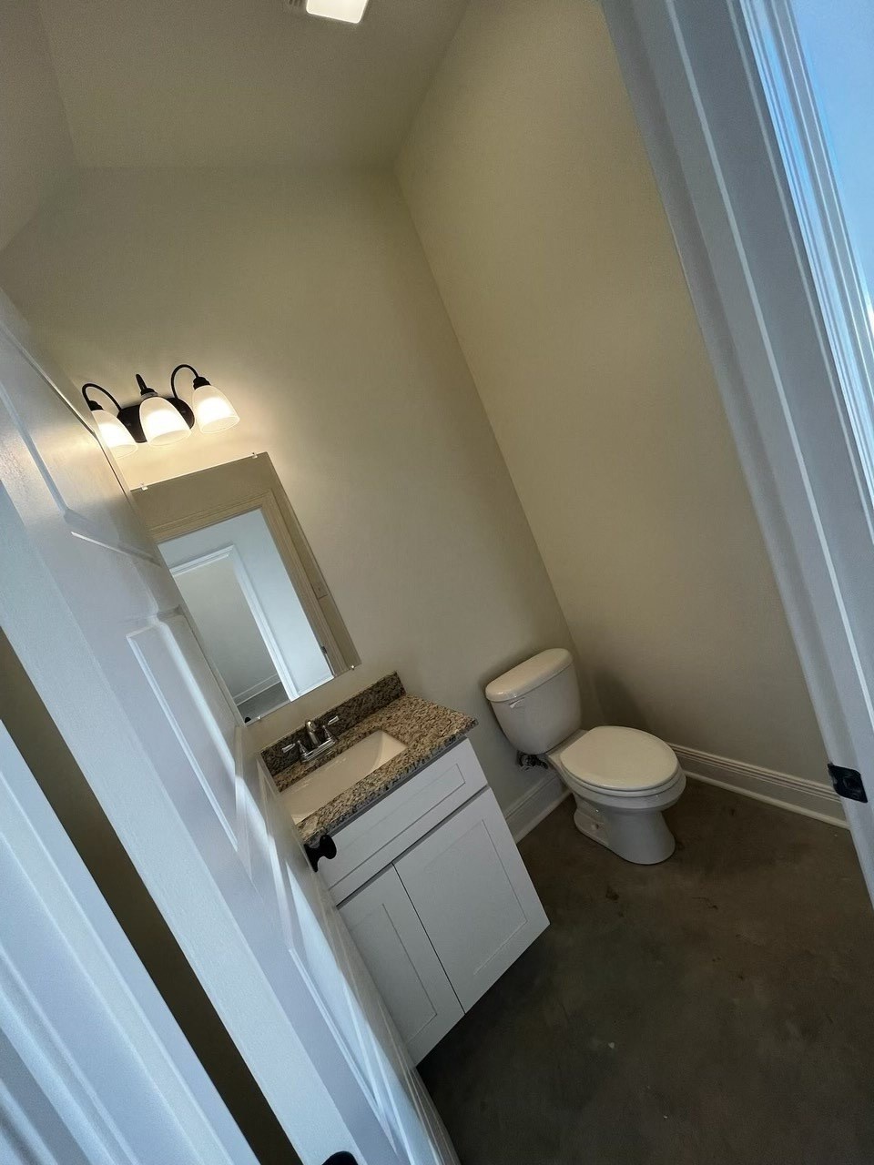 a small bathroom with a toilet and a sink