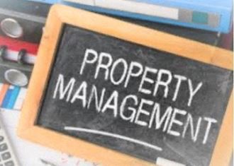 a blackboard with the words property management written on it