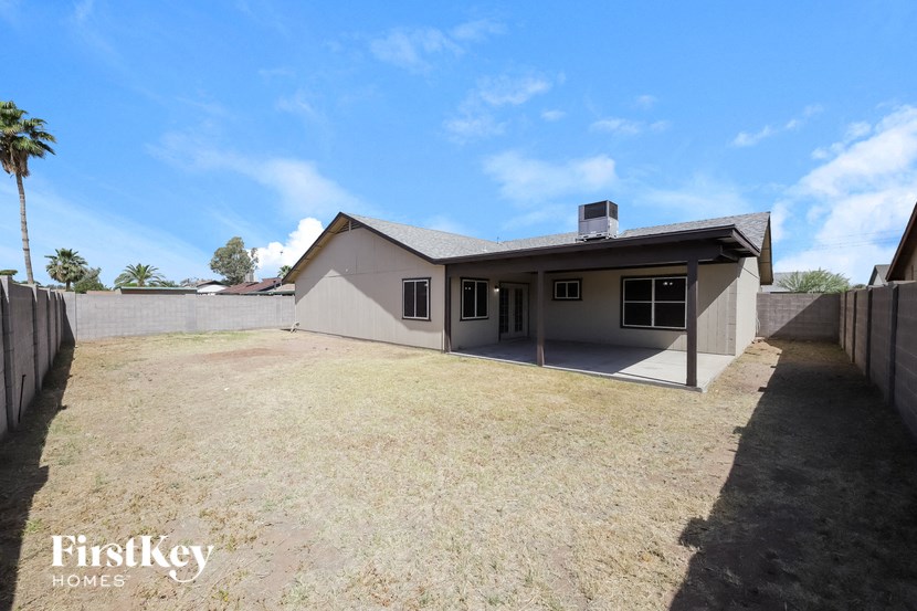 a view of the backyard from the back of the house