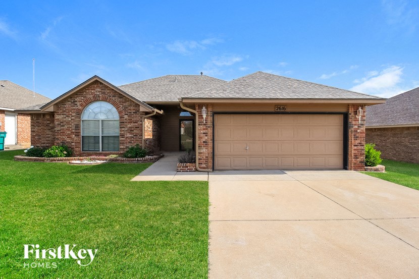 A house with a garage door that says 2666.