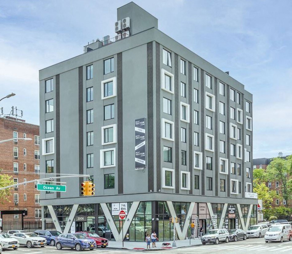 a rendering of a grey building on a city street