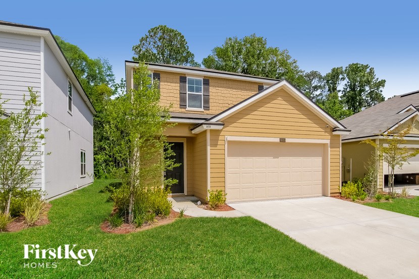 A house with a garage is shown in the image.